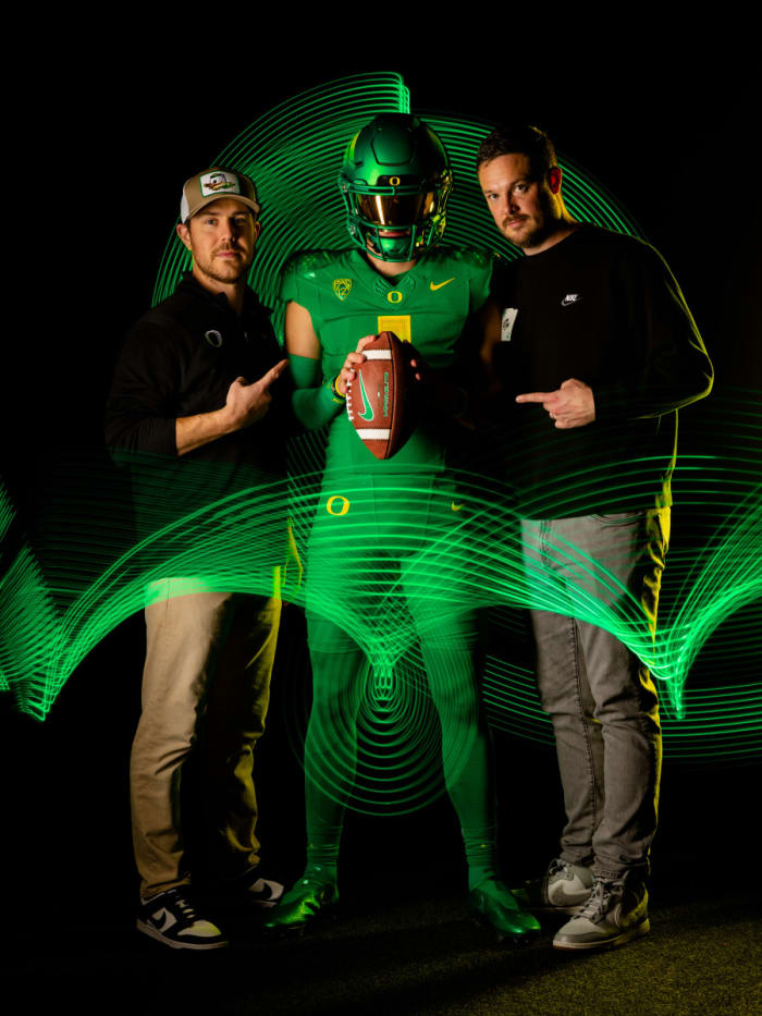 Luke Moga with Will Stein (left) and Dan Lanning (right).